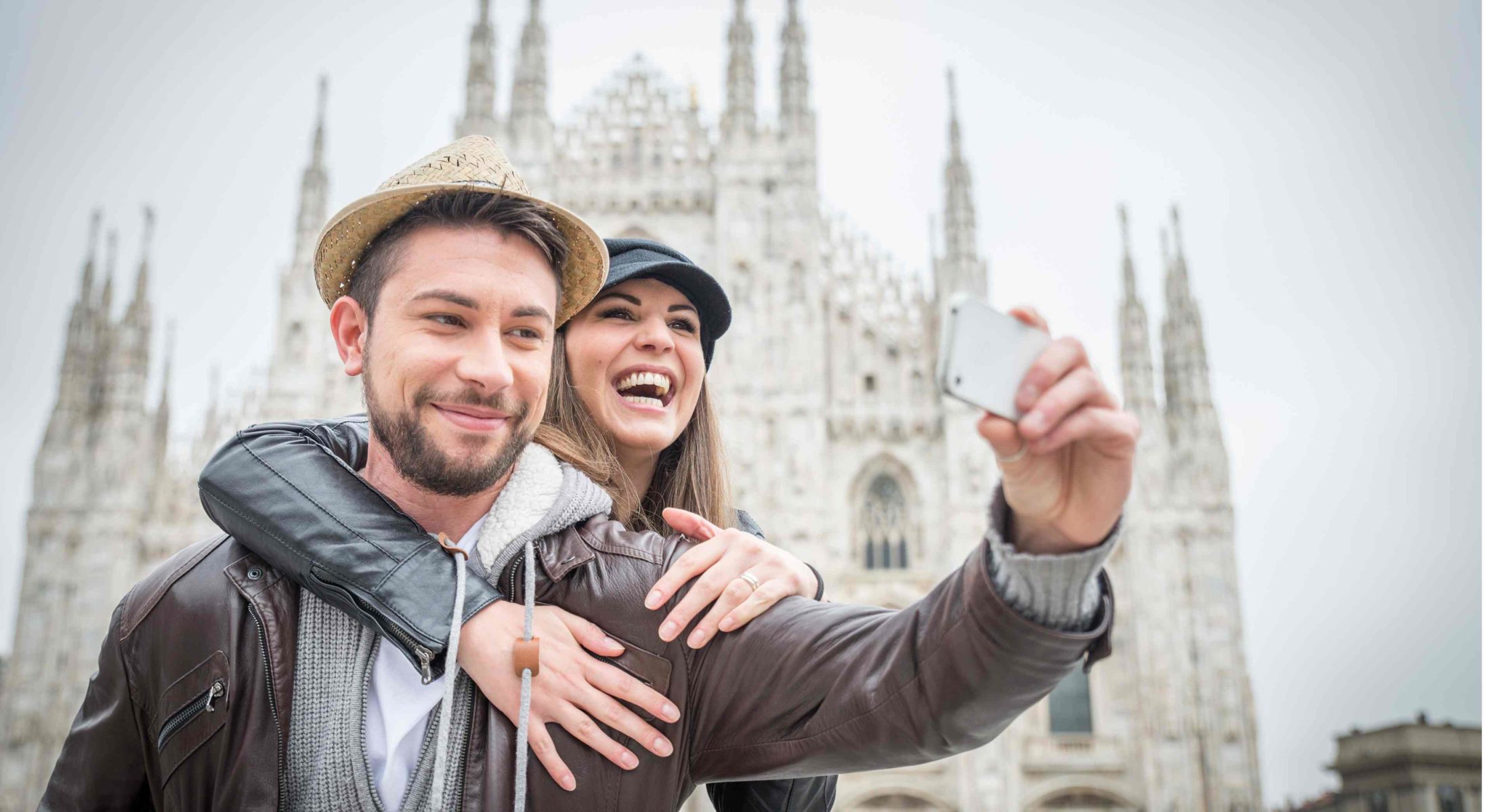 Couple taking a selfie in the Duomo Square Milan